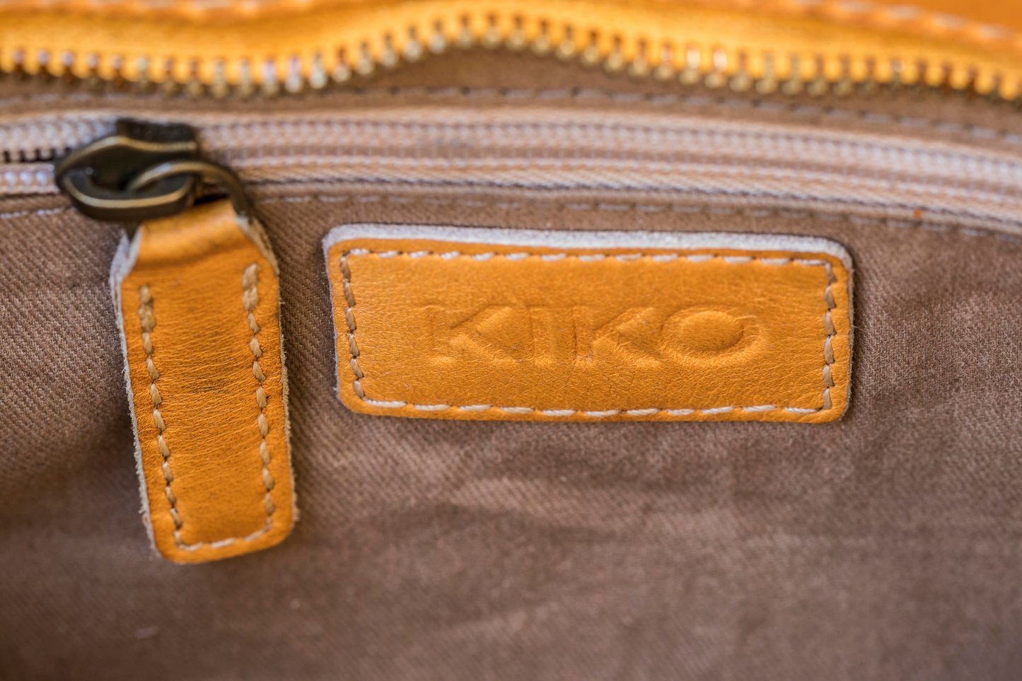 Kiko Genuine Washed Leather Weaved Crossbody - A Tapestry of Elegance and Versatility