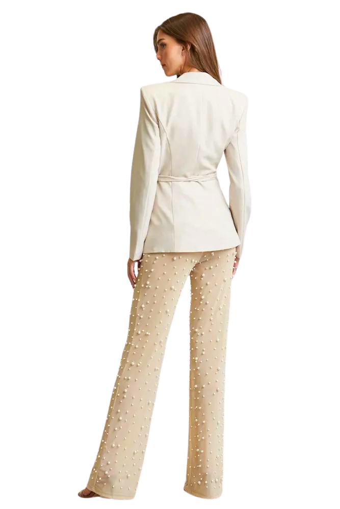 Gabardina tejida con textura Sol: una opulenta incorporación a la línea de vestidos de diseñador